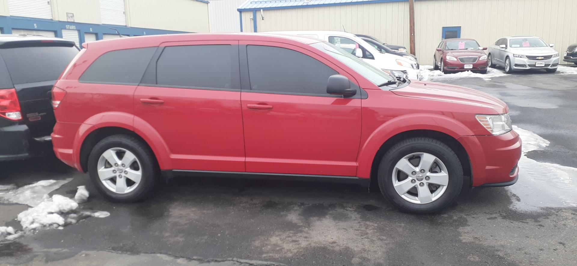 2013 Dodge Journey SE (3C4PDCAB4DT) with an 2.4L L4 DOHC 16V engine, 4-Speed Automatic transmission, located at 2015 Cambell Street, Rapid City, SD, 57701, (605) 342-8326, 44.066433, -103.191772 - Photo#1